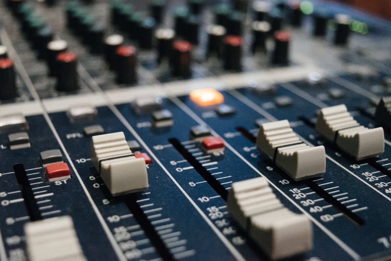 Photo by Alexey Ruban selective focus photo of DJ mixer